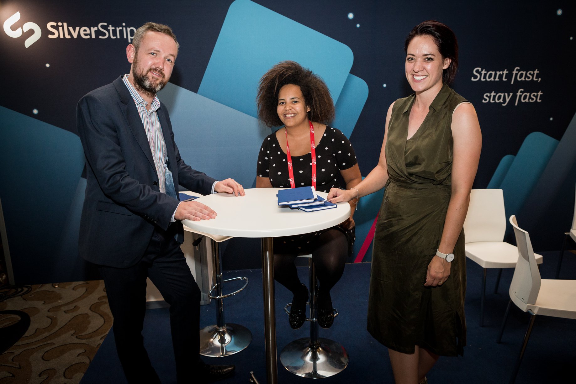 Sam Nicole and Kamala at the booth