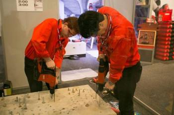 Close up of exhibitors showing power tools