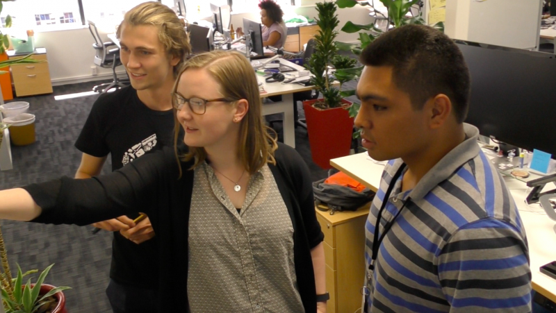 Interns performing a standup