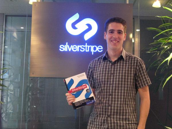Ingo holding German SilverStripe book Ingo holding German SilverStripe book